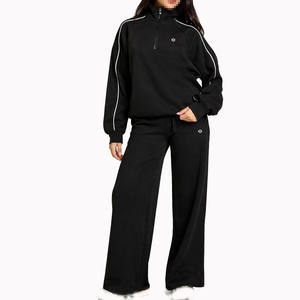 Ensemble de survêtement pour femmes en gros, sweat-shirt noir à demi-zip et pantalon de jogging à jambes larges, coupe décontractée, streetwear, vêtements de détente, approvisionnement en vrac - Product Image 1