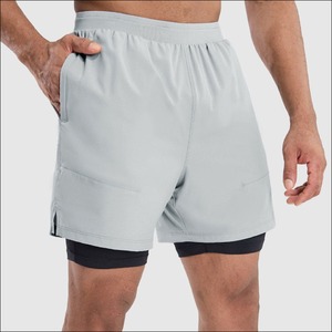 กางเกงวิ่งออกกำลังกายแบบ2 in 1ของผู้ชายระบายอากาศได้ดีแห้งเร็วเข้ายิมการฝึกโยคะมีกระเป๋า7นิ้วแบบ2 in 1สำหรับผู้ชาย - Product Image 3