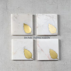 Home Dining <b>Table</b> <b>Coasters</b> Set of 4 White Marble Leaf Designing Gold Plated <b>Table</b> Ware <b>Coasters</b> With Exclusive Quality Mats Pads - Product Image 1