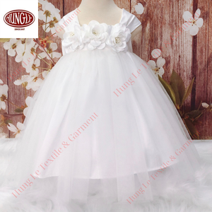 Vestido floral de manga corta con mangas abullonadas y cuello redondo para niñas, vestido de fiesta en capas hasta la rodilla con lazos grandes, nudo de corbata en la espalda, suministro ODM - Product Image 1