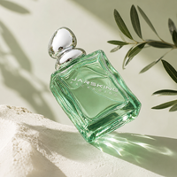 Flacon de parfum en verre ondulé 100 ml : Bocal à parfum effet vague d'eau avec bouchon boule argenté pour fragrance marine, marque privée, vente en gros