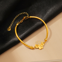 Bracelet en acier titane plaqué or véritable 18 carats, trèfle à quatre feuilles porte-bonheur, pour femme, avec tube incurvé et cœur entrelacé, résistant au ternissement