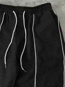 Chaqueta cortavientos de bloque de Color al por mayor de calidad superior de moda para mujer Conjunto de chándal de 2 piezas Conjunto cortavientos para hombre - Product Image 2