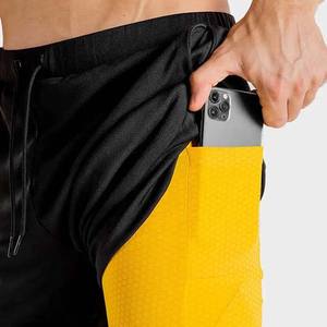 กางเกงขาสั้นสำหรับออกกำลังกายในฤดูร้อนของผู้ชายกางเกงขาสั้นผ้าฝ้ายสีดำเหลืองยืดได้มีลายสีพื้นมี6XL 2025สั่งผลิตได้ตามต้องการ - Product Image 4