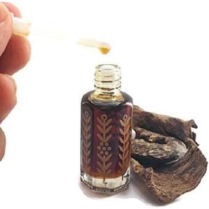 Huile d'oud naturelle: une symphonie de chaleur et d'élégance - Product Image 6