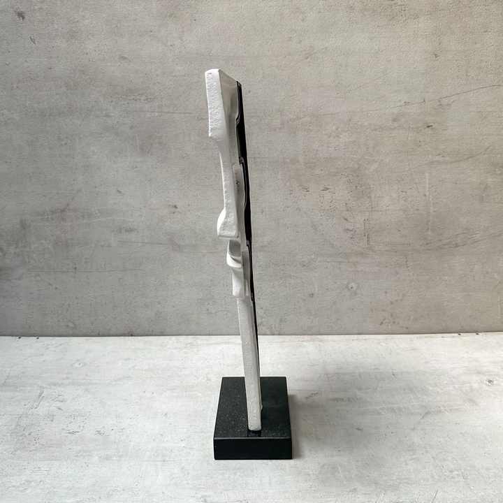 Minimalist aluminium sculpture with visual flow and brushed surface perfect for professional spaces or art gifting