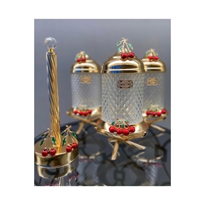 Juego de 3 tarros de cristal de latón dorado con patas de cereza Juego de 2 toalleros de rollo de cereza - Product Image 1