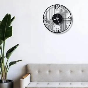 Reloj de pared de metal negro redondo único, diseño moderno y elegante, añade un aspecto sofisticado y elegante a cualquier habitación u oficina - Product Image 2
