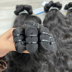 Venta al por mayor cabello humano sin procesar extensiones de cabello de trama vietnamita paquetes de cabello crudo ondulado natural - Product Image 2