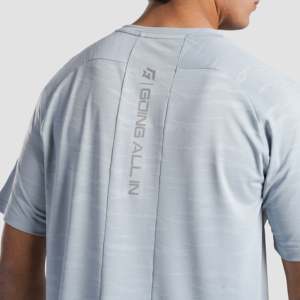เสื้อถักสีเทาแห้งเร็ว พร้อมโลโก้ปัก น้ำหนัก 180 กรัม ระบายอากาศได้ดี และพิมพ์ลายแบบสกรีน - Product Image 5