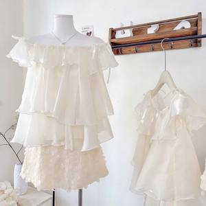 Blouse en mousseline blanche à volants et épaules dénudées pour femme, vente en gros d'usine - Product Image 6