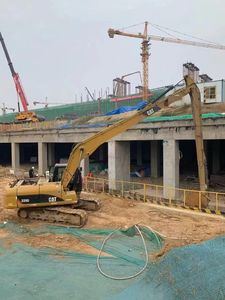 Used Caterpillar 320BL Crawler Excavator with 18m Long <b>booms</b> - Product Image 3