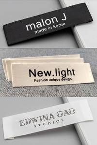 Étiquettes de vêtements personnalisées durables AL HIJRAH ABAYAS, pliées en bout, en tissu pour vêtements - Product Image 2