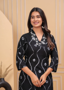 Black Cotton <b>Kurti</b> With White Floral Embroidery And Geometric Print For Women | Traditional Loose Fit Midi Kurta For Casual Wear - Product Image 6