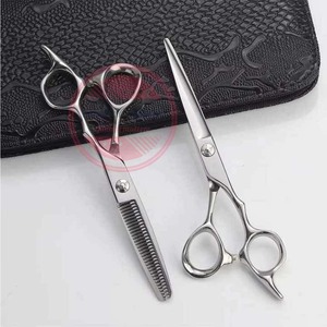 Juego de tijeras de peluquero de acero inoxidable más vendido para cortar el cabello Juego de tijeras de hoja afilada - Product Image 6
