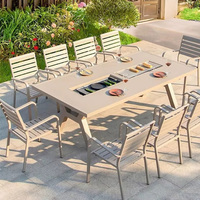 Chaise de patio moderne en aluminium inaltérable toutes saisons avec accoudoirs et dossier rond ajouré à motifs floraux, pour l'extérieur et les loisirs