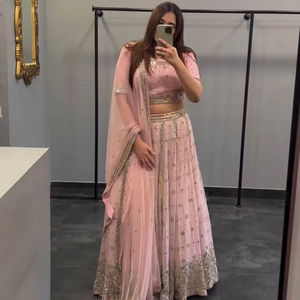 Ropa de fiesta rosa claro Faux Georgette bordado y trabajo de secuencia Lehenga y Choli con borde de encaje de cuatro lados pesado Dupatta - Product Image 1