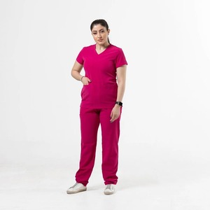 Uniforme de femme de ménage rose, ensemble de costumes de femme de chambre et nounou par Experto Uniforms - Product Image 1