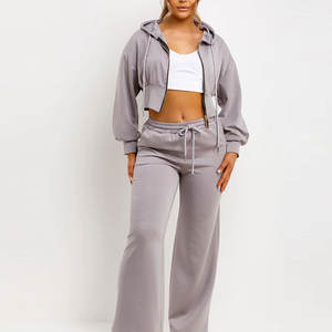 Conjunto Deportivo de Mujer con Top Corto y Pantalones Acampanados de Último Diseño, Conjunto Deportivo de Mujer con Top Corto y Pantalones Acampanados de Primera Calidad - Product Image 1