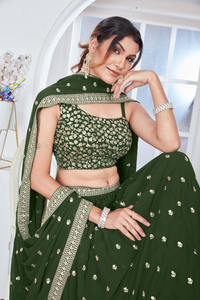 Alta demanda festiva Faux Georgette Lehenga Choli con piedra pesada y borlas de diseñador de proveedor indio - Product Image 3