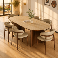 Table à manger en bois massif de luxe Vantel et chaises en cuir pour projets de mobilier de villa haut de gamme, fournisseur B2B