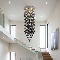 Lampe suspendue LED en acier au design nordique personnalisé, avec pendentif en spirale en pierre de charbon, idéale pour plafonds hauts, villas, hôtels, salons et escaliers