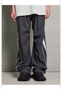 Pantalones cortavientos holgados de gran tamaño para hombre, ropa de calle de fabricante personalizada, pantalones de chándal usados de nailon con el mejor material para hombre - Product Image 6