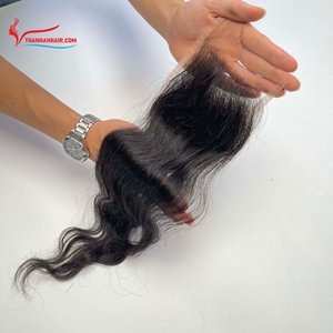 Cheveux humains HD 4x4 5x5 à fermeture frontale en dentelle Extensions de cheveux vierges bruts vietnamiens à petits nœuds - Product Image 1