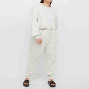 Conjunto de sudadera y pantalones de chándal cálidos personalizados de fabricante OEM suave y acogedor de alta calidad de algodón y poliéster para mujer - Product Image 1