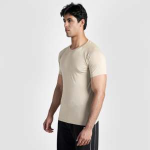 เสื้อยืดสีเบจเฮอริเทจสำหรับออกกำลังกายในยิม ชุดยิมนาสติก - Product Image 1