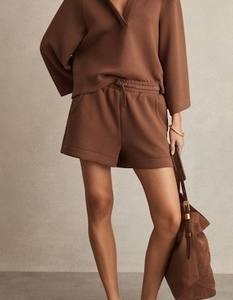 กางเกงขาสั้นระบายอากาศกีฬาสไตล์ใหม่สำหรับผู้หญิงกางเกงขาสั้นแห้งเร็วชุดกีฬาออกแบบโลโก้ได้ตามต้องการ - Product Image 2