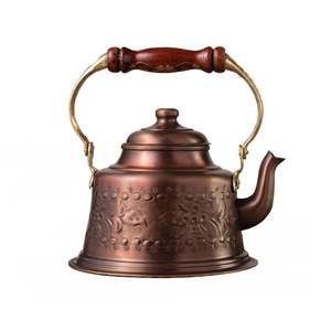 Beautiful hammered copper <b>kettle</b> with ergonomic design perfect for <b>tea</b> brewing kitchen decoration and premium gift choices - Product Image 1