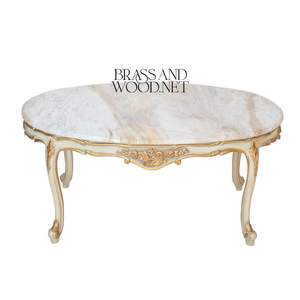 Mesa de Centro Clásica de Lujo con Tapa de Mármol Blanco, Patas Talladas en Oro Ornamentadas, Acabado de Diseño Europeo Elegante - Product Image 1