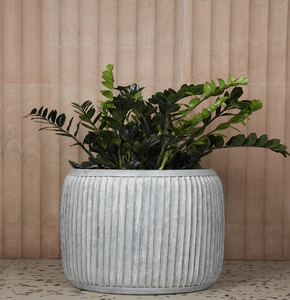 Tall black metal planters with golden geometric stands, stunning modern decor essentials, available at wholesale prices. - Product Image 4