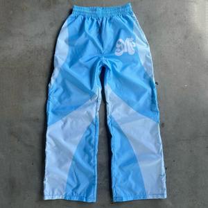 OEM Hombres Joggers Pantalones Cordón Cintura Patrón Logo Bordado Pantalones de chándal Cortavientos Pantalones de chándal Personalizado Nylon Pantalones Hombres - Product Image 2