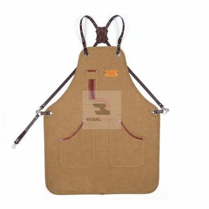 Delantal de barbero sin mangas cómodo ajustable poliéster impermeable personalizado con cuero PU incluye algodón y materiales de mezclilla - Product Image 6