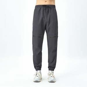 กางเกงคาร์โก้ใส่ได้ทั้งชายและหญิงวัสดุแนวสตรีทแฟชั่นทนทานสไตล์ทรงหลวมสำหรับการเดินทางและชุดกีฬา OEM - Product Image 6