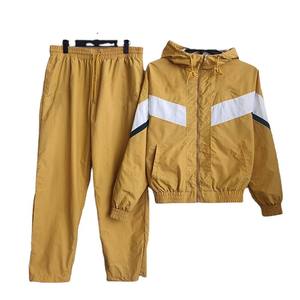 Últimos chándales personalizados de alta calidad para hombre de talla grande Método de tejido deportivo conjuntos cortavientos de estilo informal para hombre - Product Image 1