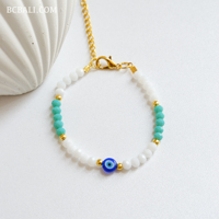 Bracelets en perles de cristal avec breloque œil porte-bonheur, style bohème, cadeau pour femme, symbolisme protecteur et design avant-gardiste