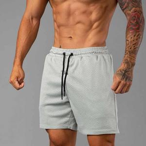 Pantalones cortos de malla de estilo informal con patrón único de ropa deportiva de baloncesto para hombre de algodón 100% personalizados para entrenamiento y correr - Product Image 6