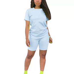 2025 precio al por mayor alta calidad gimnasio Fitness mujeres camisetas y pantalones cortos conjuntos Color sólido verano y ropa deportiva mujer conjunto doble - Product Image 1