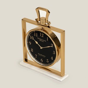 Reloj de mesa de metal es un símbolo duradero de la artesanía, la elegancia y la funcionalidad atemporal que enriquece cada habitación donde se encuentra. - Product Image 2