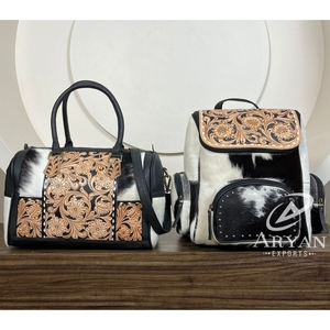 Venta al por mayor de bolsas de lona de viaje de cuero con herramientas manuales y mochila de pañales de cuero de vaca con herramientas manuales a juego de equipaje de 2 piezas - Product Image 1