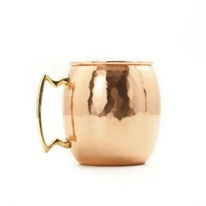 Mug en cuivre, principalement en cuivre, souvent avec une finition martelée pour un aspect esthétique. - Product Image 1