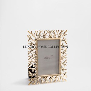 Marcos de fotos de latón de primera calidad con acabados de lujo perfectos para mostrar momentos preciados en un hogar elegante - Product Image 1