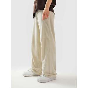 Pantalon décontracté taille mi-haute à jambes larges en tissu éponge respirant couleur crème avec détail de passepoil - Product Image 1