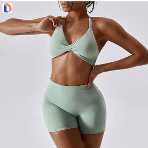 Women's Active Gym Wear Two-Piece Set Solid Color Sports Bras & Above Knee Legging <b>Shorts</b> with Lace Button Decoration Wholesale - Product Image 2