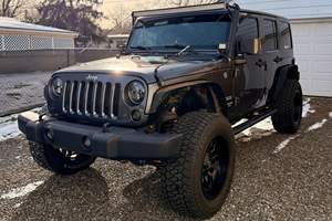 Jeep Wrangler Unlimited Sport 4x4 V6 2017 Usado, Potencia V6, Tracción en las Cuatro Ruedas, Color Gris Granito Cristalizado, Modificaciones Todoterreno - Product Image 3