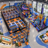 Aire de jeux intérieure commerciale pour sports actifs avec parcours de cordes, obstacles Ninja, mur d'escalade, fosse de mousse et toboggan tubulaire pour FEC personnalisé