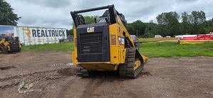 Chargeuse sur pneus CAT 299D avec attache broyeur, modèle à chenilles jaunes - Product Image 3